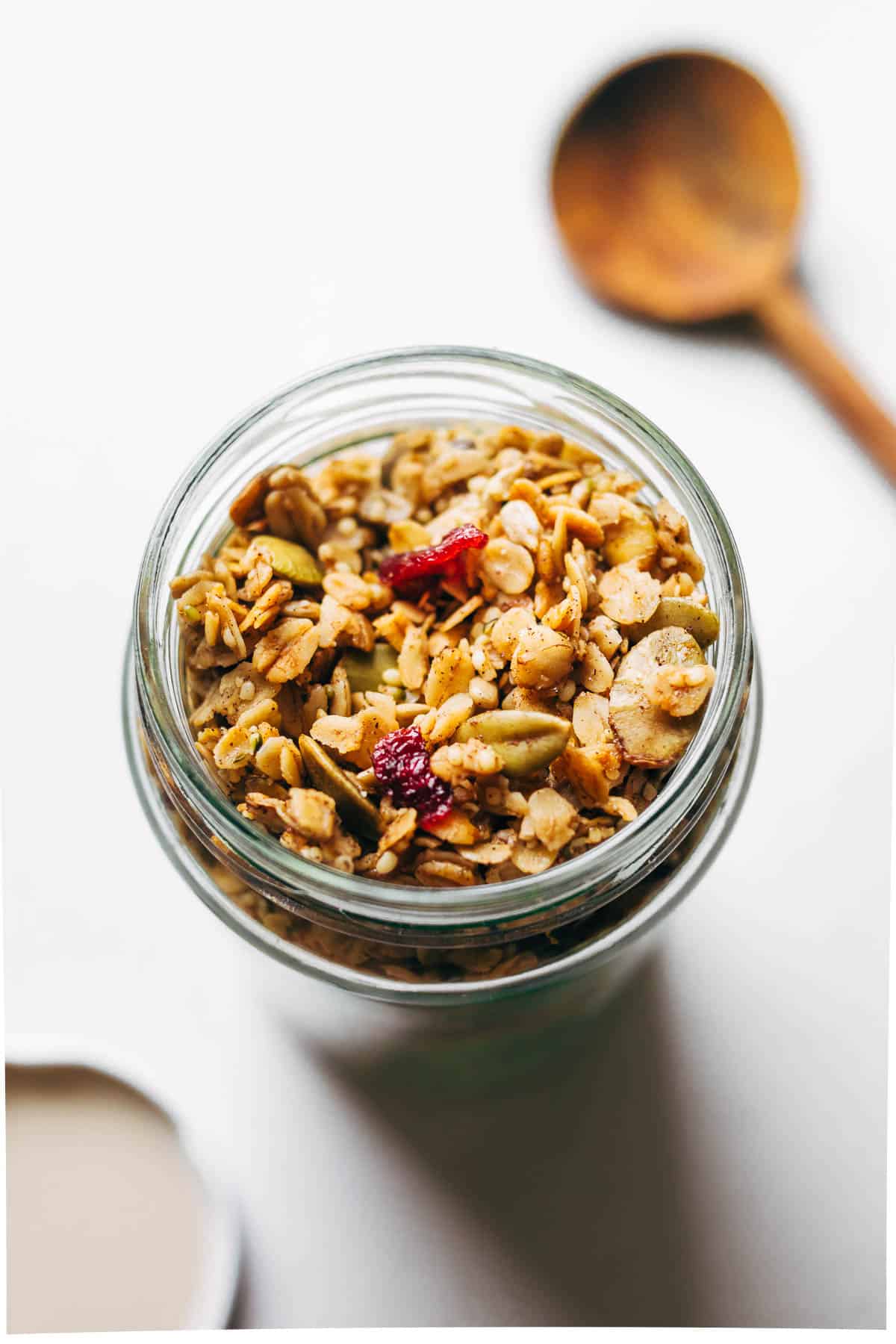 Close up of the top of a jar filled with granola.