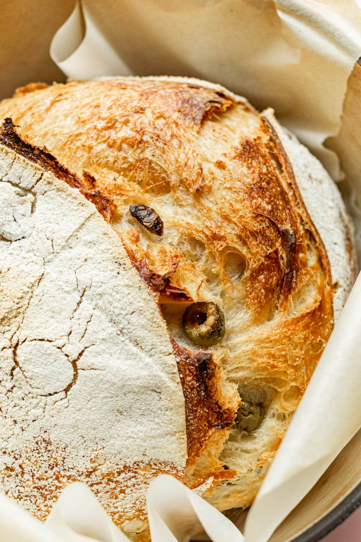 This sourdough olive bread is a crusty, rustic loaf studded throughout with salty, briny Castelvetrano olives, but use any olives you like!