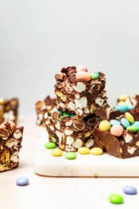 Rocky road squares with pastel-coloured candies around.