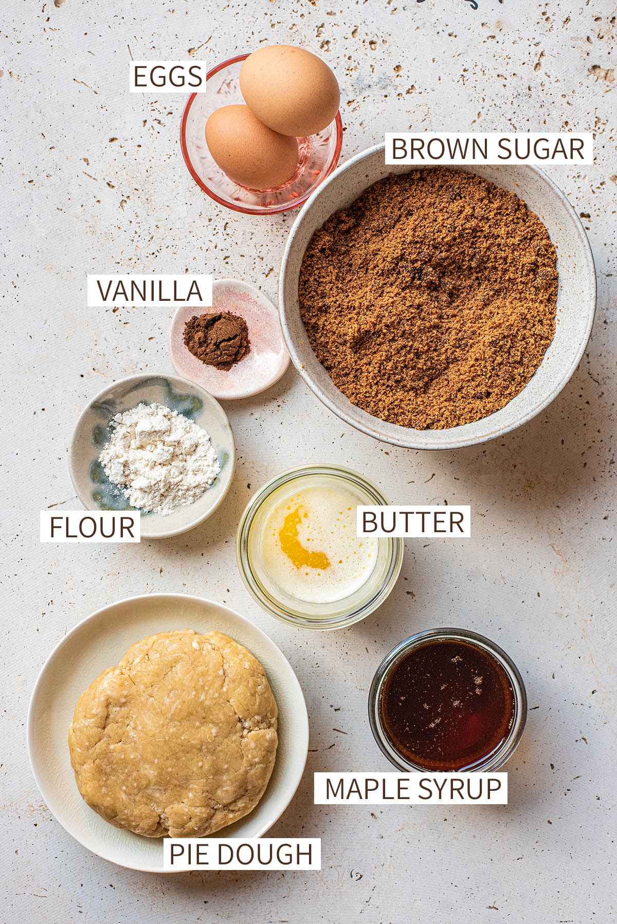 Maple butter tart ingredients with labels.