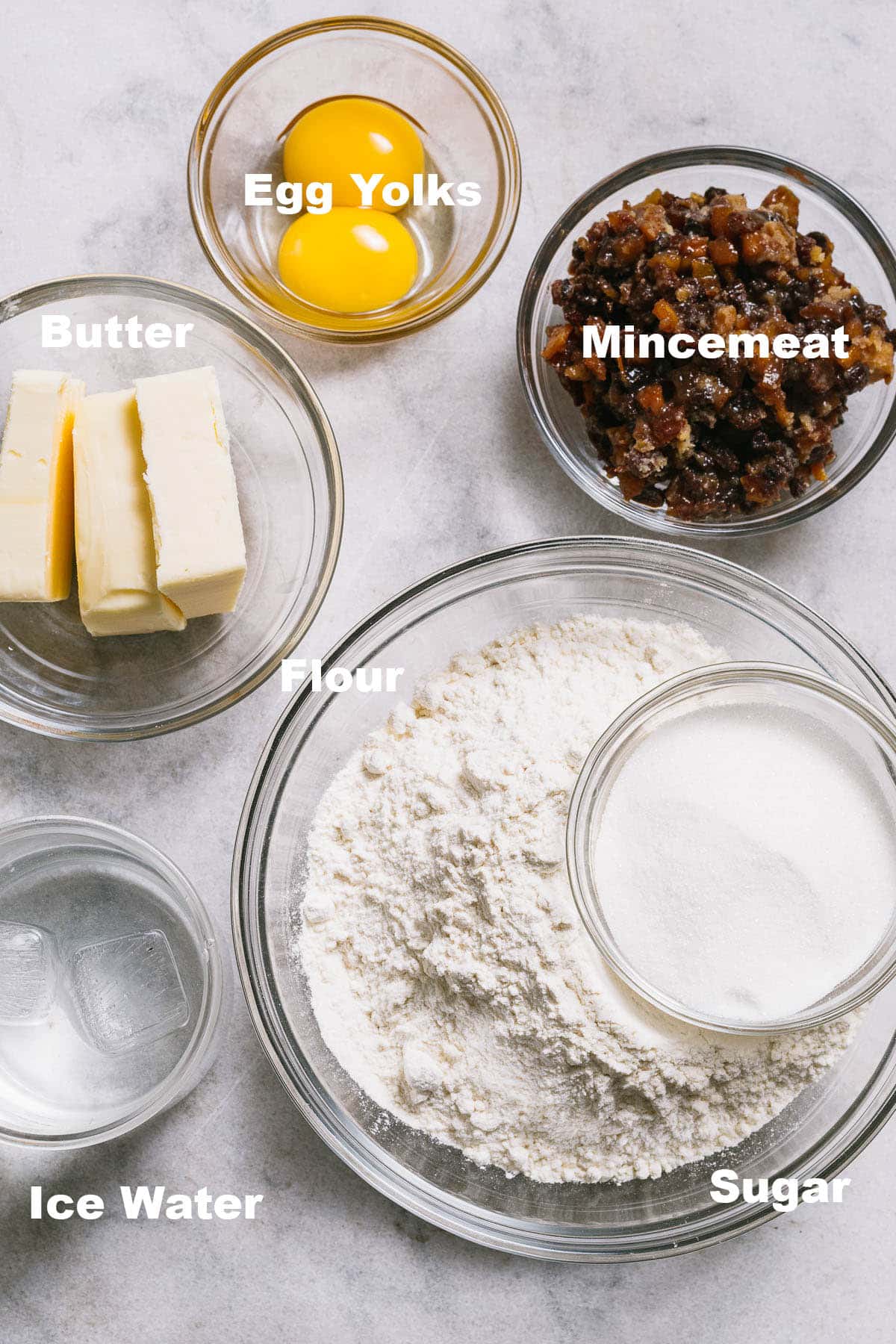 Mincemeat tart ingredients with labels.