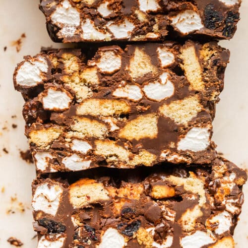 Close up of sliced rocky-road bars with marshmallows and cookies.