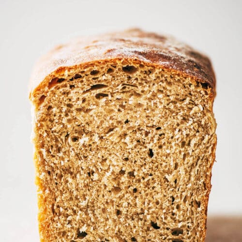 Front view of a loaf of bread, cut to show interior.