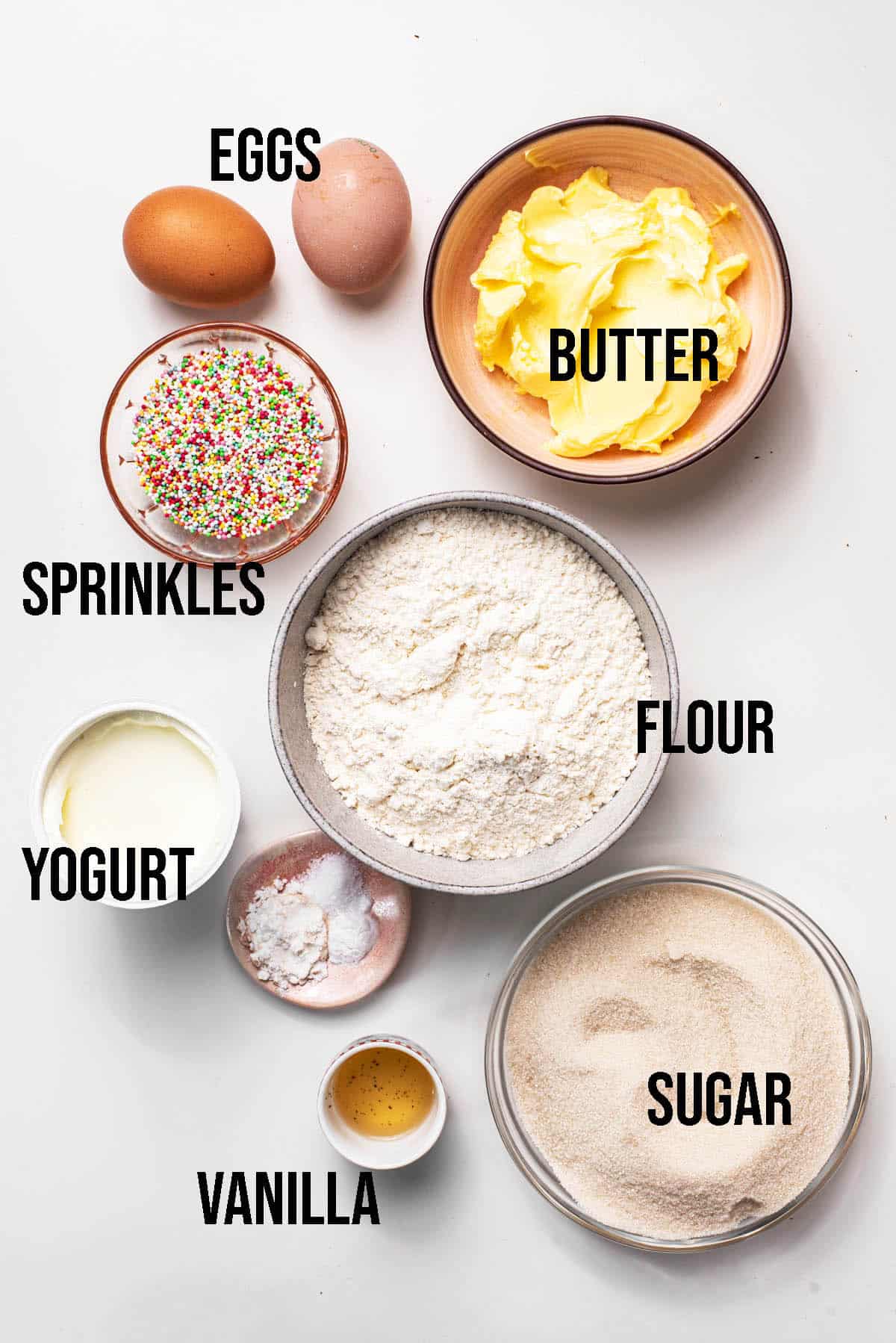 Sprinkle cupcake ingredients with labels.