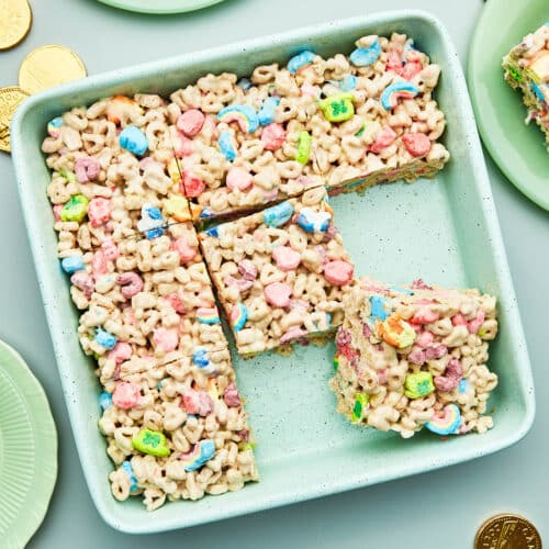 Cereal treats in a square baking dish, cut into squares.