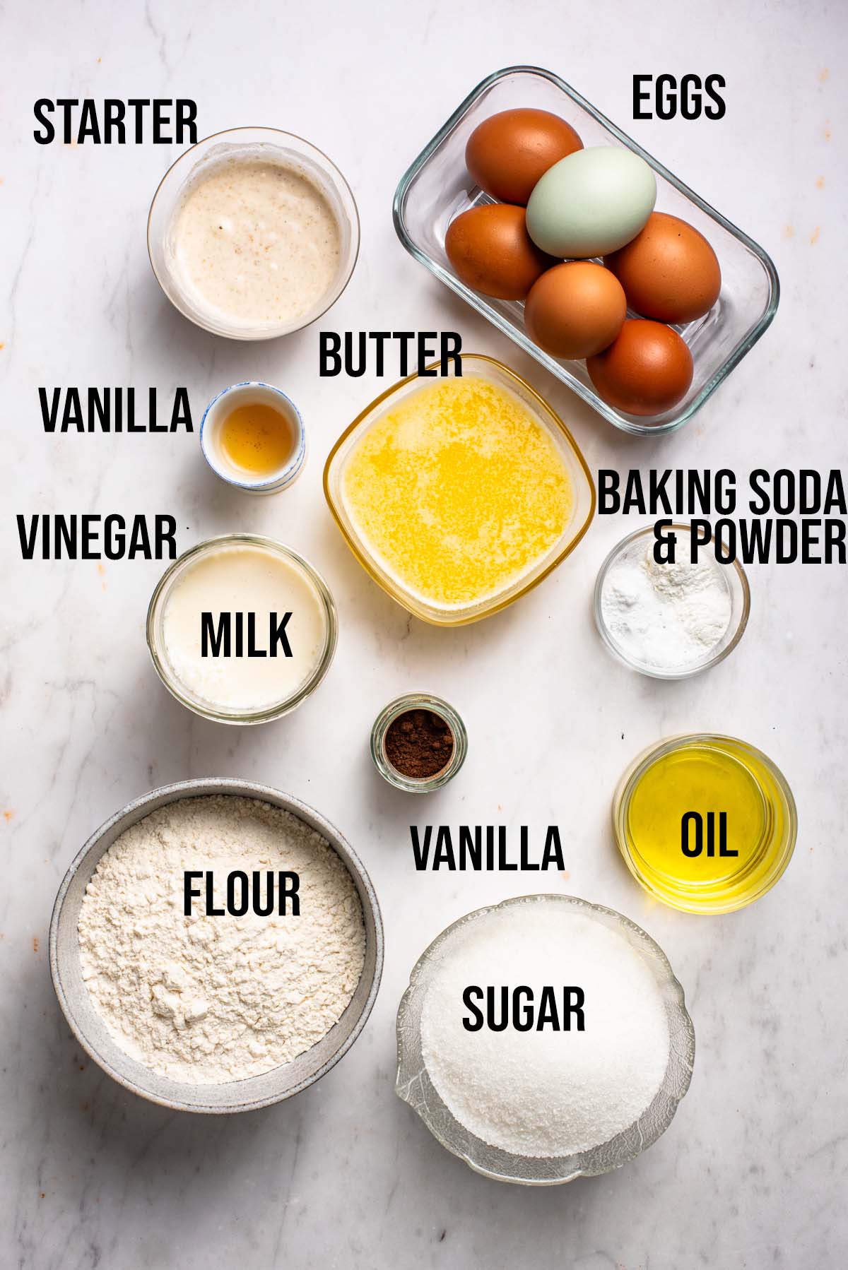 Sourdough vanilla cake ingredients with labels.