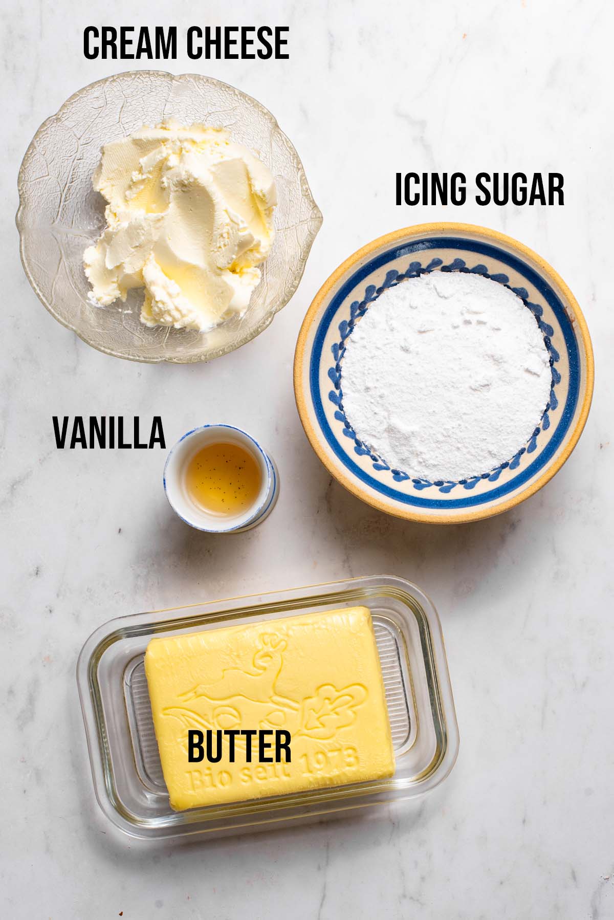 Cream cheese frosting for cinnamon rolls ingredients with labels.